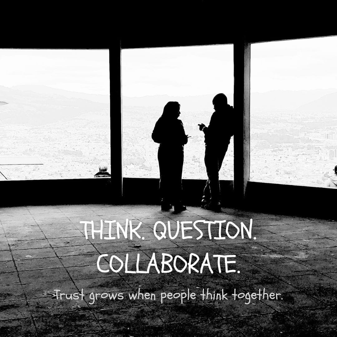 Black and white image of two silhouetted people talking against a large window overlooking a city skyline. Text reads: "THINK. QUESTION. COLLABORATE. Trust grows when people think together."